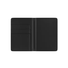 Load image into Gallery viewer, The black interior, with several pockets,  of a faux leather passport cover.