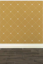 Load image into Gallery viewer, Stylized cream-coloured bees intersecting diagnonal lines on a gold-coloured wallpaper: L'Abeille Française