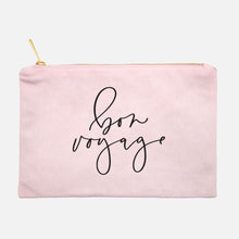 Load image into Gallery viewer, Powder-pink cotton canvas cosmetic bag with 'bon voyage' printed on the front in black script: L'Abeille Française