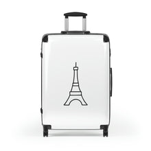 Load image into Gallery viewer, Large hard-shell suitcase with black Eiffel Tower graphic on white background is accented by black trim, back, wheels and telescoping handle: Boutique L'Abeille Française