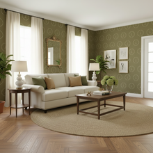 Load image into Gallery viewer, Living room with a white sofa, wooden coffee table, and moss green coloured wallpaper with cream Eiffel Tower design: L'Abeille Française