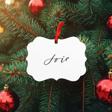 Load image into Gallery viewer, Decorative Christmas ornament with &#39;Joie&#39; text on a green pine branch background.