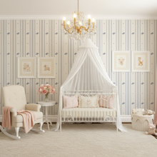 Load image into Gallery viewer, Romantic baby nursery with cream-coloured wallpaper with alternating vertical stripes of lavender blue coloured stylized flower petals and narrow lines: Boutique L'Abeille Française