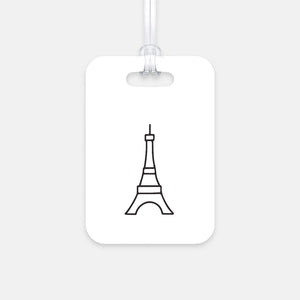 Hard, white plastic luggage tag with a graphic of the Eiffel Tower printed on it in black