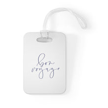 Load image into Gallery viewer, Hard, white plastic luggage tag with Bon Voyage written on it in a blue script