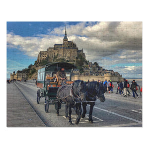 14" × 11" 252 precise interlocking piece jigsaw puzzle of a team of horses pulling a passenger wagon in front of Mont Saint Michel in France: L'Abeille Française