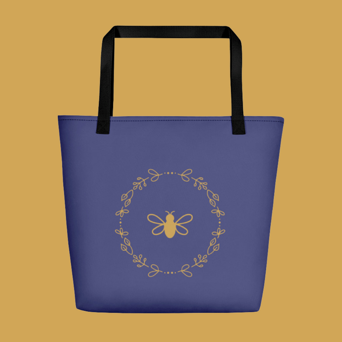 Royal Bee Tote lavender front with gold bee and wreath graphic printed in the centre, black stitching and webbing handles: Boutique L'Abeille Française