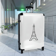 Load image into Gallery viewer, Large hard-shell suitcase with black Eiffel Tower graphic on white background is accented by black trim, back, wheels and telescoping handle: Boutique L&#39;Abeille Française