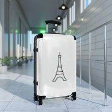 Load image into Gallery viewer, Medium-sized hard-shell suitcase with black Eiffel Tower graphic on white background is accented by black trim, back, wheels and telescoping handle: Boutique L&#39;Abeille Française