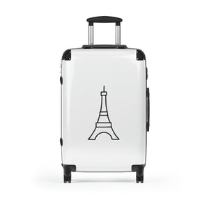 Medium-sized hard-shell suitcase with black Eiffel Tower graphic on white background is accented by black trim, back, wheels and telescoping handle: Boutique L'Abeille Française