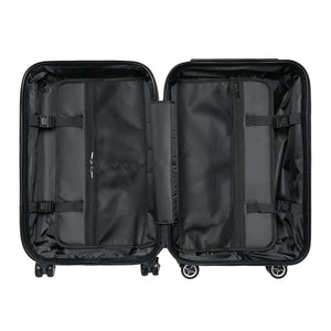 Black interior of medium-sized Take Me To Paris hard-shell suitcase with 2 zippered inner pockets and black wheels: Boutique L'Abeille Française