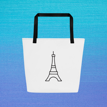 Load image into Gallery viewer, Take Me To Paris Tote white front with a black stylized Eiffel tower graphic printed in the centre, black stitching and webbing handles: Boutique L&#39;Abeille Française