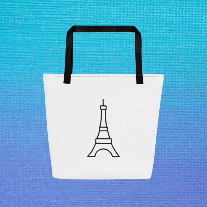 Take Me To Paris Tote white front with a black stylized Eiffel tower graphic printed in the centre, black stitching and webbing handles: Boutique L'Abeille Française