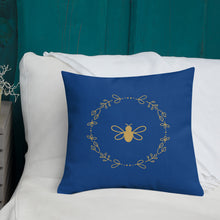 Load image into Gallery viewer, Square navy coloured cushion with a gold bee &amp; wreath motif